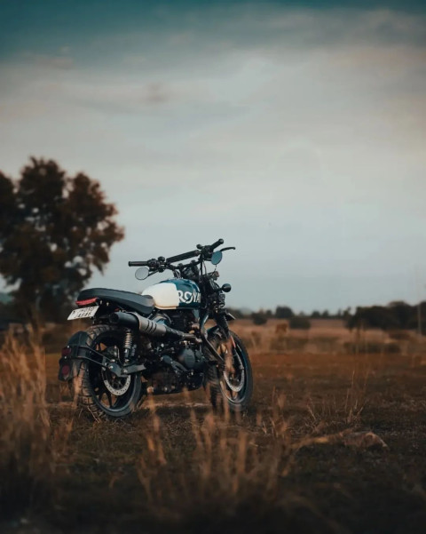 Cool Backgroud With Motorcycle in Stand and Nature Dark Stock