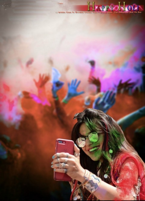 Mother Playing Holi With Color Powders With Her Son,taking Selfie